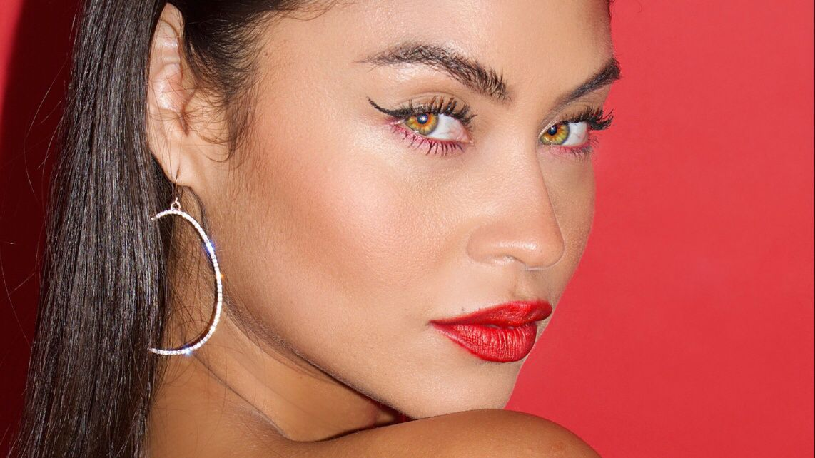 Viviana close-up portrait with red background